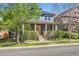 Charming two-story home featuring a welcoming front porch and well-manicured lawn in a desirable neighborhood at 3386 Beeler Ct, Denver, CO 80238