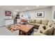 Basement living room with kitchenette and seating area at 3386 Beeler Ct, Denver, CO 80238