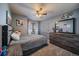 Stylish bedroom with a dresser and a queen-size bed at 12590 Prince Creek Dr, Parker, CO 80134