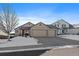 Two-story home with a three car garage, and well maintained landscaping at 12590 Prince Creek Dr, Parker, CO 80134