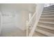 Finished basement and stairway with plush carpet and a clean, neutral color palette at 5882 W 109Th Ave, Westminster, CO 80020