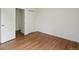 A clean bedroom featuring wood-look flooring and a spacious closet at 5882 W 109Th Ave, Westminster, CO 80020