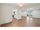 Spacious living room open to the kitchen featuring hardwood floors and plenty of natural light at 5882 W 109Th Ave, Westminster, CO 80020
