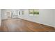 Large, bright living area featuring gorgeous hardwood floors and seamlessly connects to the kitchen at 5882 W 109Th Ave, Westminster, CO 80020