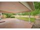 Covered patio features brick paving and overlooks a spacious backyard at 5882 W 109Th Ave, Westminster, CO 80020