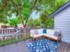 Outdoor deck with comfortable seating, decorative pillows, and a stylish rug perfect for relaxing and entertaining at 12646 Osceola St, Broomfield, CO 80020