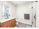 Contemporary bathroom featuring wood vanity, and glass-enclosed shower creating a spa-like retreat within the home at 1901 Wazee St # 419, Denver, CO 80202