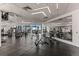Bright gym featuring weight machines, cardio equipment, mirrored walls, and city views at 1901 Wazee St # 419, Denver, CO 80202