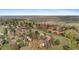 Wide aerial view of homes with lush greenery, creating a peaceful and inviting community at 3620 Silver Plume Ln, Boulder, CO 80305