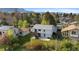 Lovely backyard featuring a patio, trees, and well-maintained lawn, perfect for outdoor living at 3620 Silver Plume Ln, Boulder, CO 80305