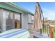 Charming deck with a table and umbrella, accessible from a sliding glass door, ideal for outdoor relaxation at 3620 Silver Plume Ln, Boulder, CO 80305