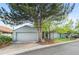 Charming home featuring a two-car garage and well-maintained front lawn with mature trees at 3620 Silver Plume Ln, Boulder, CO 80305