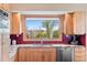 Bright kitchen features wooden cabinets, stainless steel appliances, and a large sink area at 3620 Silver Plume Ln, Boulder, CO 80305