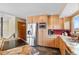 Contemporary kitchen design featuring granite countertops, stainless steel appliances, and light wood cabinetry at 3620 Silver Plume Ln, Boulder, CO 80305