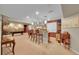 Finished basement featuring a stylish bar area, pool table, and decorative mural at 25262 E 2Nd Pl, Aurora, CO 80018