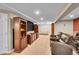 Basement home theater and entertainment area featuring a large screen TV and leather seating at 25262 E 2Nd Pl, Aurora, CO 80018