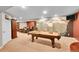 Finished basement features a pool table and entertainment area with custom mural at 25262 E 2Nd Pl, Aurora, CO 80018