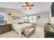 Elegant bedroom with a ceiling fan, and neutral walls at 25262 E 2Nd Pl, Aurora, CO 80018