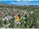 View of home nestled within a picturesque landscape, surrounded by greenery and mountain views at 7134 Kiowa Rd, Larkspur, CO 80118