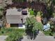 This home features lush landscaping and a beautiful setting surrounded by mature trees and manicured lawn at 7134 Kiowa Rd, Larkspur, CO 80118
