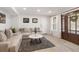 A cozy living room features recessed lighting, plush sofa, and a decorative rug creating a welcoming atmosphere at 7134 Kiowa Rd, Larkspur, CO 80118
