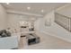 Finished basement featuring carpet flooring, neutral walls, recessed lighting, and a comfortable seating area at 22583 E Union Cir, Aurora, CO 80015