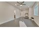 Finished basement featuring gray flooring, recessed lighting, and exercise equipment at 22583 E Union Cir, Aurora, CO 80015