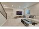 Carpeted finished basement with neutral walls, recessed lighting, cozy seating area, and entertainment center at 22583 E Union Cir, Aurora, CO 80015