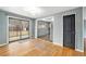 Bright room with hardwood floors, sliding door access, creating a perfect transition from inside to outside living at 3149 Wheeling St, Aurora, CO 80011