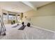 Large fitness room with two big windows and yoga equipment at 8390 E Summit Rd, Parker, CO 80138