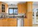 Kitchen with stainless steel appliances and wood cabinets at 446 Dione Pl, Lone Tree, CO 80124