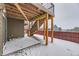 Ground-level patio under deck, provides additional outdoor space at 1405 Willow Oak Rd, Castle Rock, CO 80104