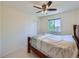 A lovely main bedroom features a ceiling fan and a window with natural light at 1817 Buttercup Rd, Elizabeth, CO 80107