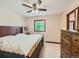 Cozy bedroom featuring a ceiling fan and wood furniture at 1817 Buttercup Rd, Elizabeth, CO 80107