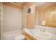 Clean bathroom with shower over tub and vanity sink at 31755 Ponderosa Way, Evergreen, CO 80439
