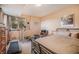 Comfortable bedroom featuring a treadmill, exercise bike, and a cozy bed at 31755 Ponderosa Way, Evergreen, CO 80439