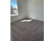 Bedroom featuring carpet and natural light from the windows at 21996 E 39Th Pl, Aurora, CO 80019
