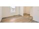 Light-filled room with hardwood floors, fresh paint, and natural light at 21996 E 39Th Pl, Aurora, CO 80019