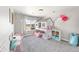 Bright bedroom featuring playful bunk beds, decorative accents, and a window with views at 2576 Villageview Ln, Castle Rock, CO 80104