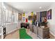 Office area with wood-look flooring, large window with bright light, desk and decor at 2576 Villageview Ln, Castle Rock, CO 80104