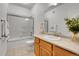 Well-lit bathroom with a vanity and shower/tub combination at 1194 Red Lodge Dr # 201, Evergreen, CO 80439