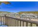 Scenic view of townhouse complex nestled in the trees, seen from a wood-framed balcony at 1194 Red Lodge Dr # 201, Evergreen, CO 80439