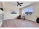 Bright living room with large windows and cozy armchair at 1194 Red Lodge Dr # 201, Evergreen, CO 80439