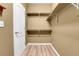 Ample walk-in closet with custom shelving and plenty of room for storage and organization at 1194 Red Lodge Dr # 201, Evergreen, CO 80439