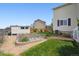Fenced backyard featuring garden area and storage shed at 5302 S Robb Ct, Littleton, CO 80127