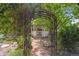 Picturesque gazebo with decorative wrought iron and lush surrounding greenery at 5302 S Robb Ct, Littleton, CO 80127