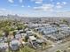 An aerial cityscape captures modern homes with city skyline views and vibrant neighborhood settings at 2010 Irving St, Denver, CO 80211