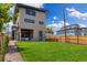 Large backyard with patio and lush green grass, great for outdoor entertaining at 2010 Irving St, Denver, CO 80211