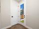 Entryway with modern door leading to a fenced in outdoor area at 2010 Irving St, Denver, CO 80211