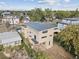 Exterior aerial view of home showing flat roof design, backyard and surrounding neighborhood at 2010 Irving St, Denver, CO 80211